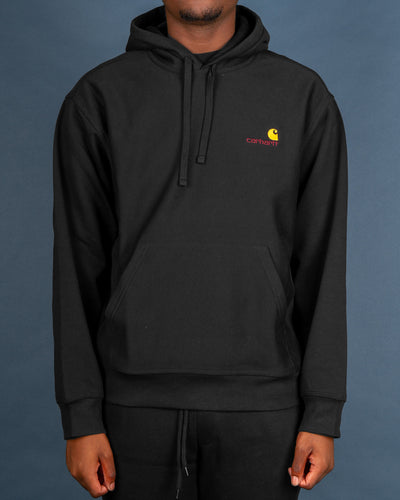 A staple piece in everyone's wardrobe, no one does it better than Carhartt. Designed for casual layering and easy wear, the Hooded American Script Sweat in black is crafted from a soft yet heavyweight fleece back jersey, providing warmth and comfort. This popover hoodie is fitted with a drawstring hood and two side pockets as well as the brand's iconic golden ratio American script logo embroidered on the front chest.