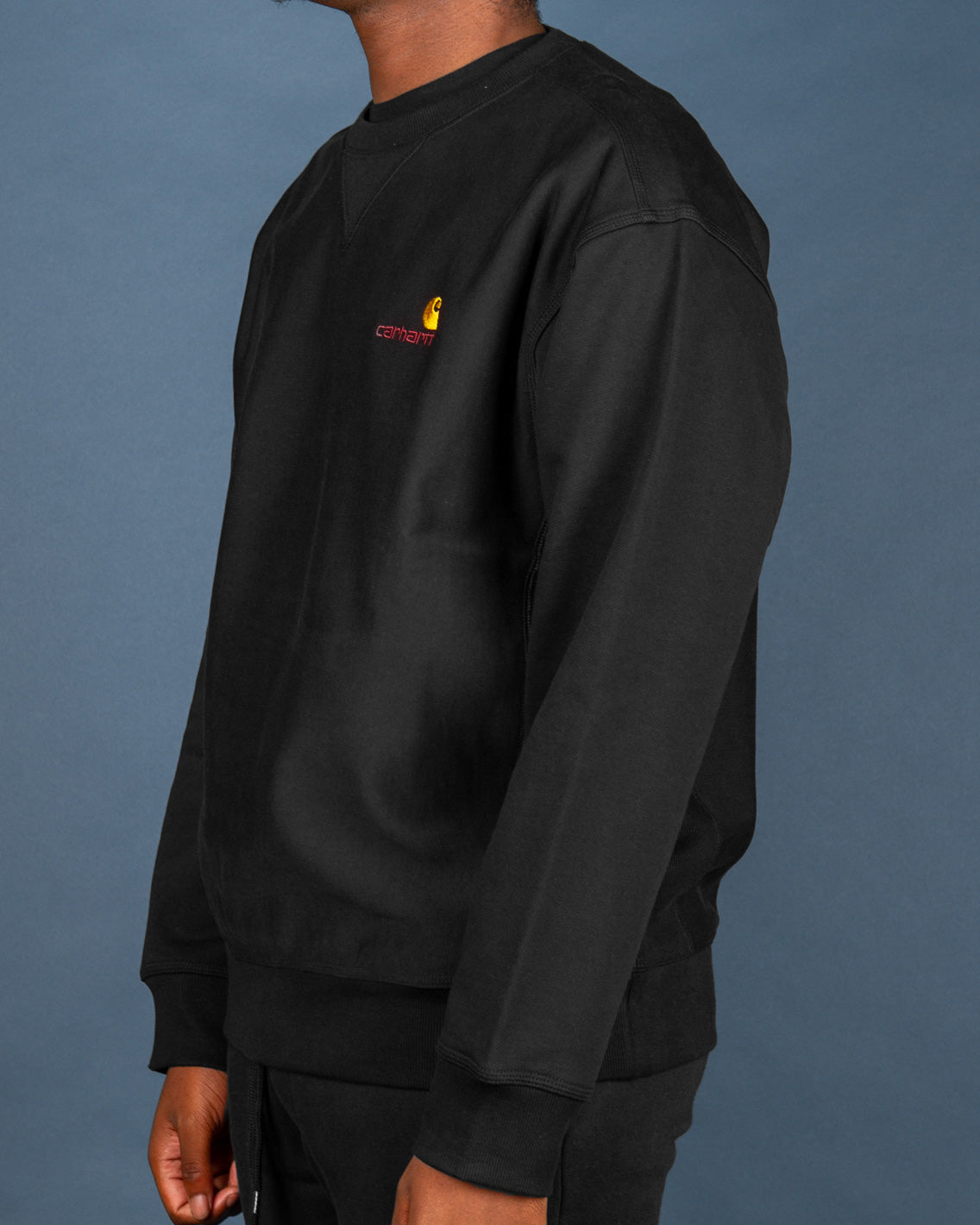 Carhartt WIP brings simply and effortless styling with the American Script Sweat in Black. This black crewneck is made from a premium cotton fleece back jersey blend and features comfortable ribbed trims. Signed off with the iconic Carhartt logo embroidered on the chest.