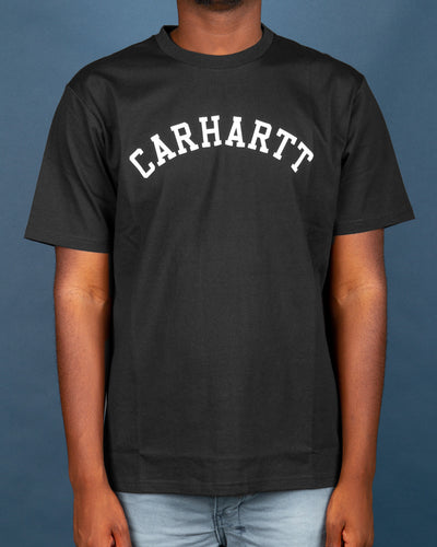 The Carhartt University Tee in Black features an arched Carhartt team logo printed in white on the front. Cut from premium cotton and finished with a comfortable ribbed neckline. This short-sleeved tee is perfect for layering with a jacket and bringing simplicity and classic to any outfit.