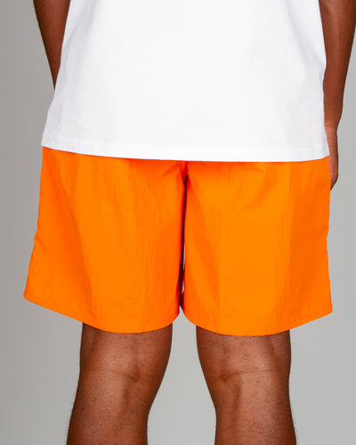 Ready to make you stand out at the pool or the beach, the HUF DWR Fuck It Easy Short in Persimmon is a pair of bright orange swim shorts. Constructed from premium, lightweight nylon with a DWR coating which shows an all-over 'FUCK IT' print when the shorts are wet. These shorts are sure to keep eyes turning your way and are signed off with a HUF woven label, front and back pockets, and an elasticated waistband for extra comfort.