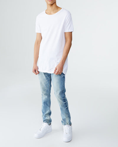 One of our favourite denim styles from Ksubi. The Ksubi Chitch denim in Pure Dynamite is constructed with a mid-rise and made from heavy-duty premium stretch cotton. These jeans are coloured with a deep blue and signed off with a vintage wash for an aged look. Finished with signature Ksubi branding and hardwear.