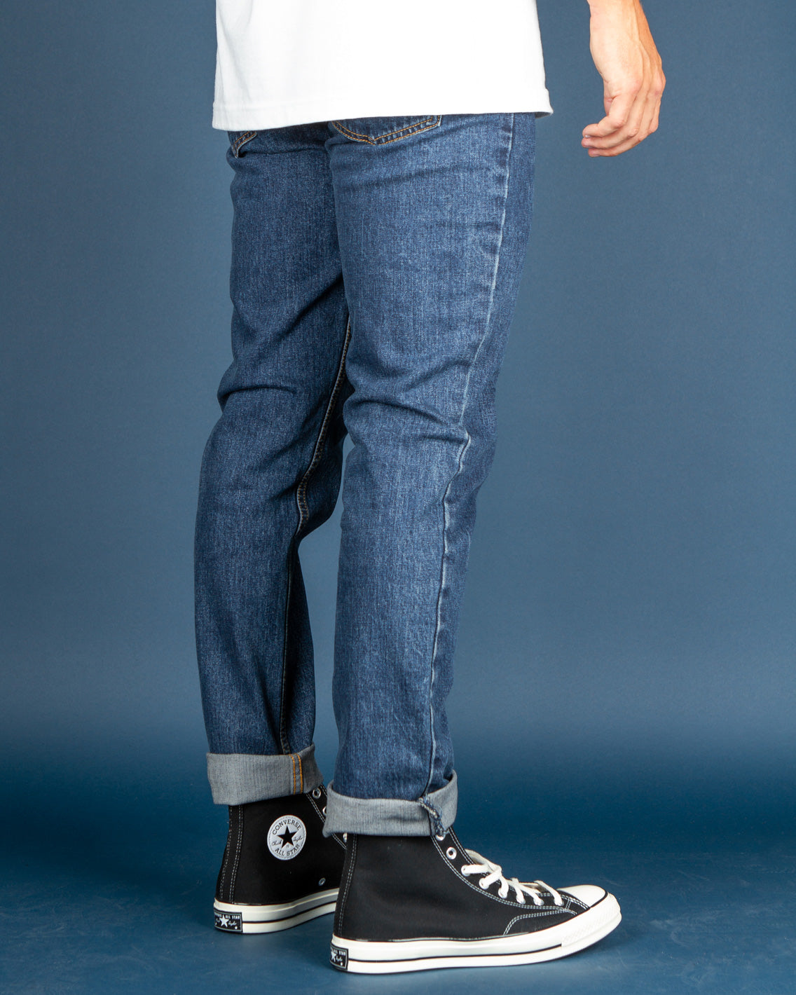 The Levi's 511 is a slim fit from hip to ankle. Features five pocket styling, zip fly, and is constructed with stretch denim in Dark Stonewash.
